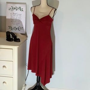 BCBG MaxAzria red strapless asymmetrical dress.